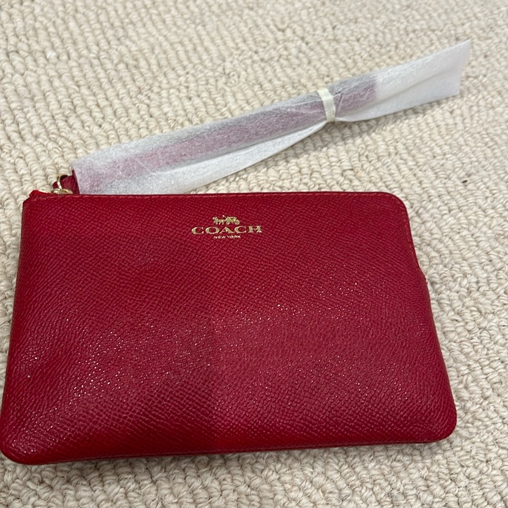 Brand new Coach zip wallet red